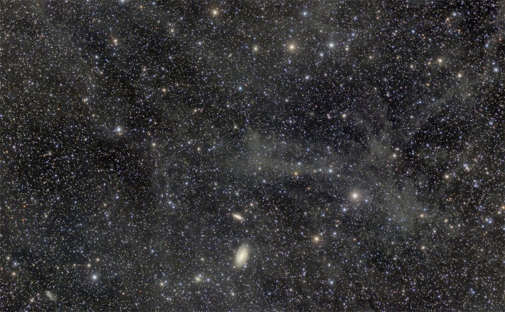 IFN nebula in Great Bear constellation - M81 and M82 galaxies at the bottom. Canon camera and 135mm lens
