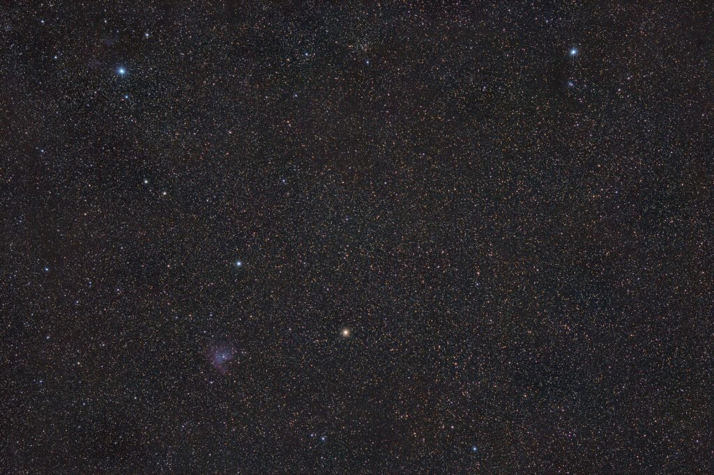 Cassiopeia fragment shot with Canon 550D and Samyang 135 lens. 30 frames stack at different settings.